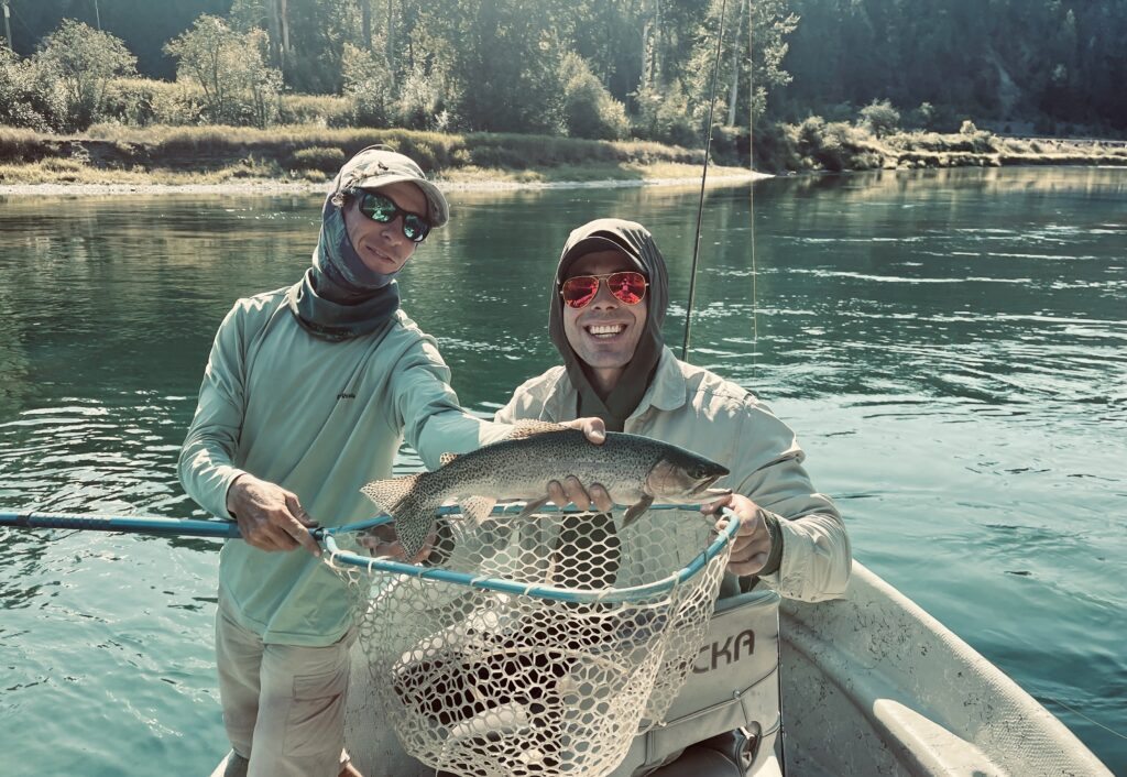 A happy angler and KCA fishing guide on the Kootenai River in Idaho